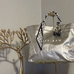 Metallic Silver Tote Bag with Reflective Finish and Studded Detail